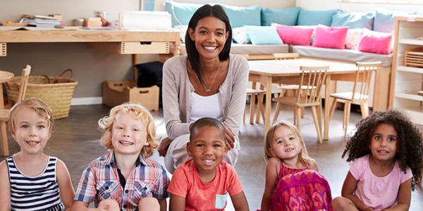 children and teacher in the classroom