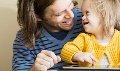 Father and daughter laughing