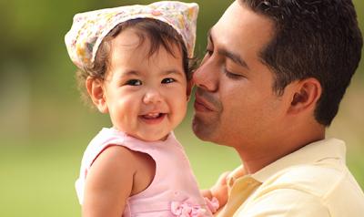 Dad singing to daughter