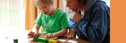 son and mother playing a game 