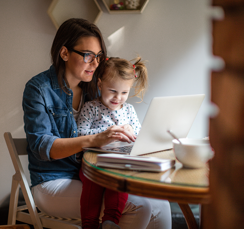 mother and daughter on laptop