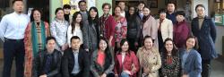 Cotrainers Dr. Nili Luo and Dr. Lea Ann Christenson with a group of teachers, directors, and investors from China