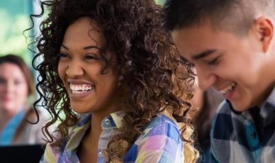 Two young educators smiling