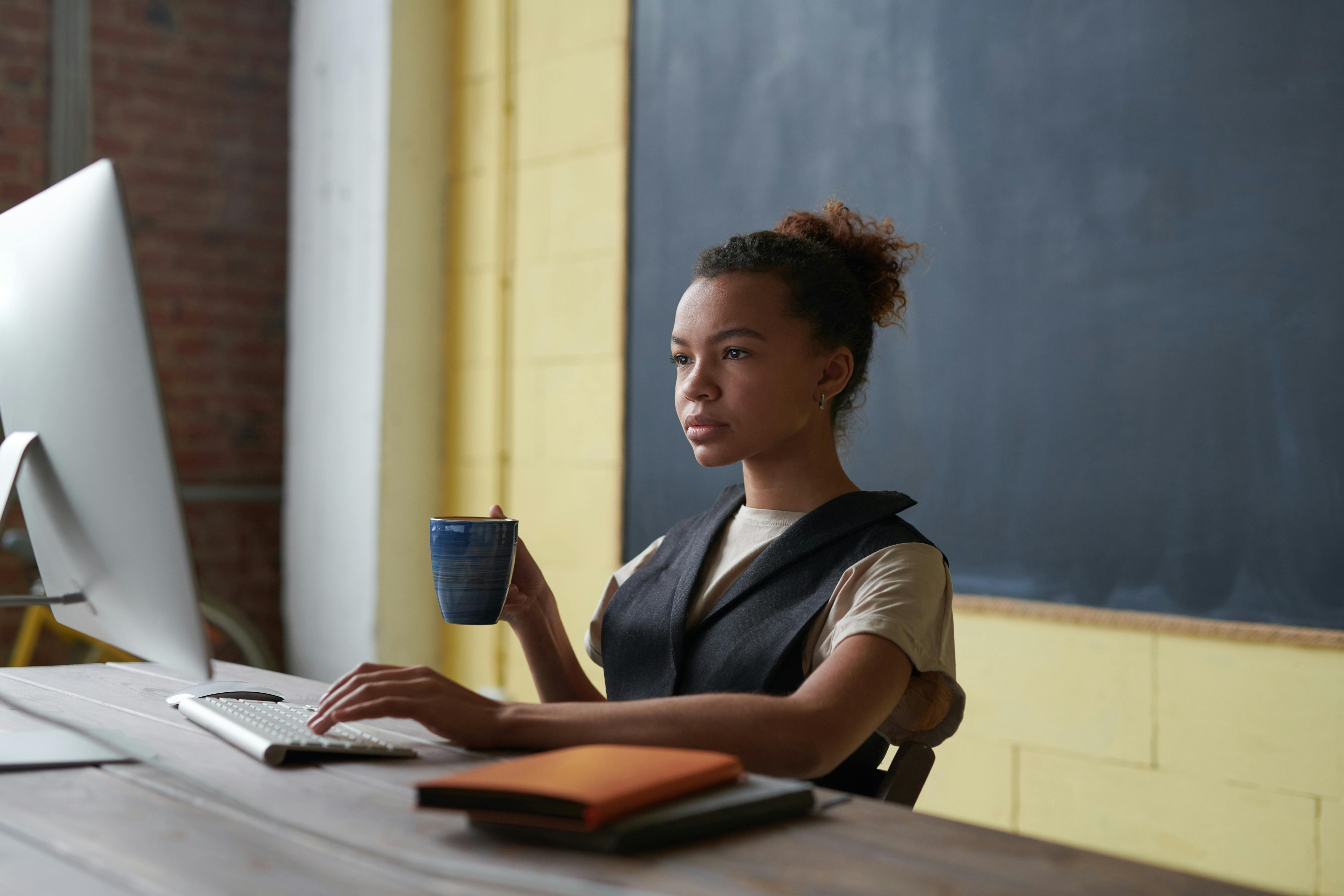 A teacher on her computer