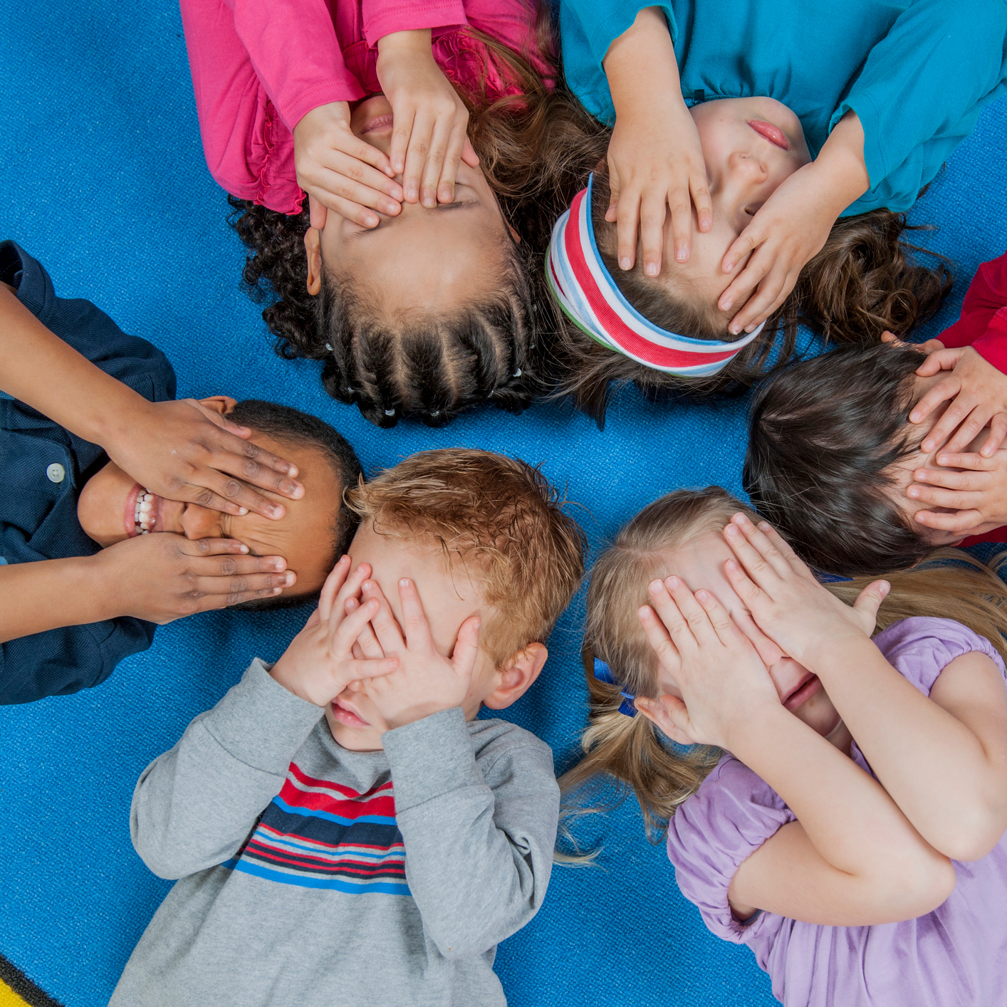 Children playing peek-a-boo