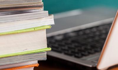 Laptop and books