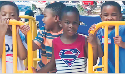 Four boys on playground