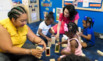 tonia durden and michelle kang visiting a center