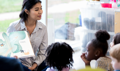 a teacher reading to children