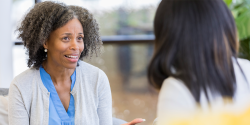 a teacher talking to a parent